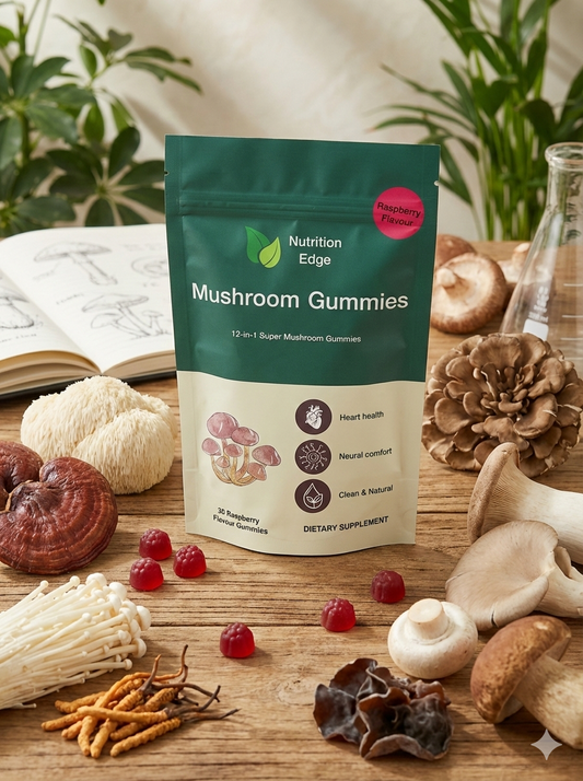 Nutrition Edge 12-in-1 Mushroom Complex Gummies pouch on a wooden table surrounded by fresh Lion's Mane, Reishi, Enoki, and Cordyceps mushrooms.