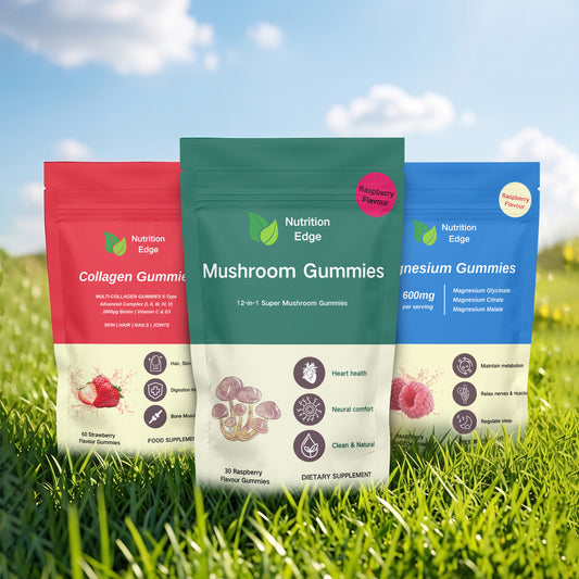 Three packs of Nutrition Edge gummies on grass with a blue sky background